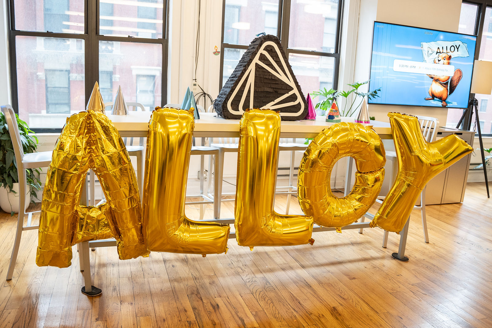 Gold ALLOY balloon letters in the Alloy office