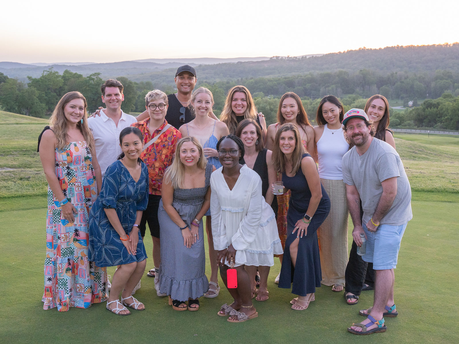 Alloy teammates together outdoors at a company offsite