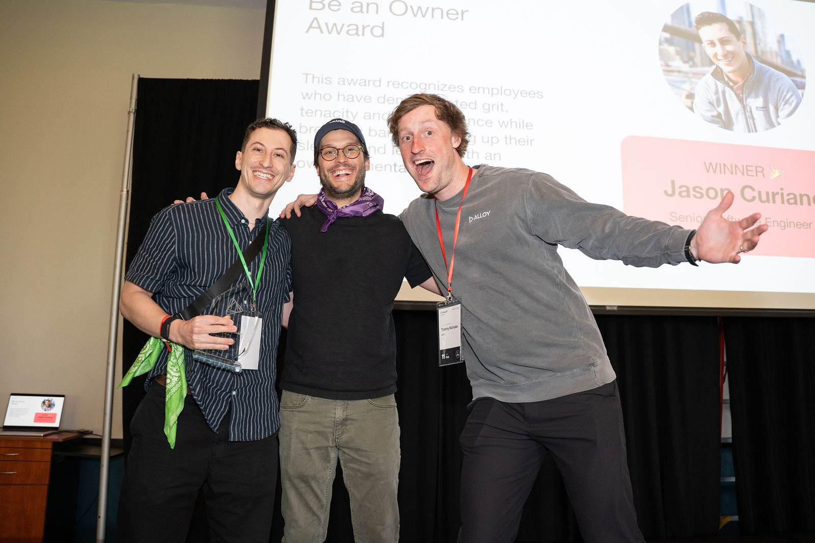 Alloy teammates celebrating a Be an Owner award